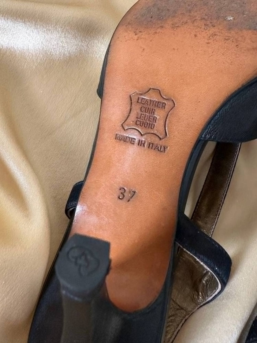 Sandali neri in pelle e raso con fiocco “Yves Saint Laurent”