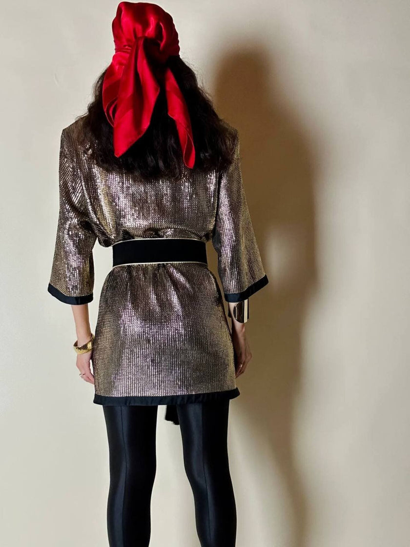 Mini dress oro in tessuto operato con profili neri in raso nero  “Yves Saint Laurent”