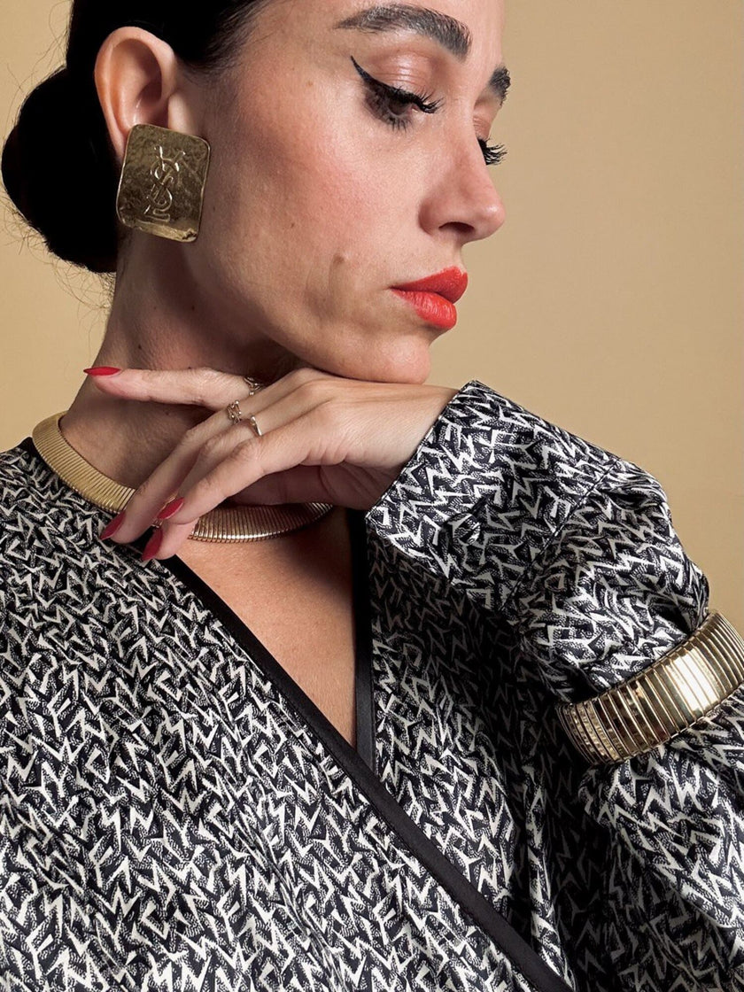 Maxi clip oro con logo “Yves Saint Laurent”