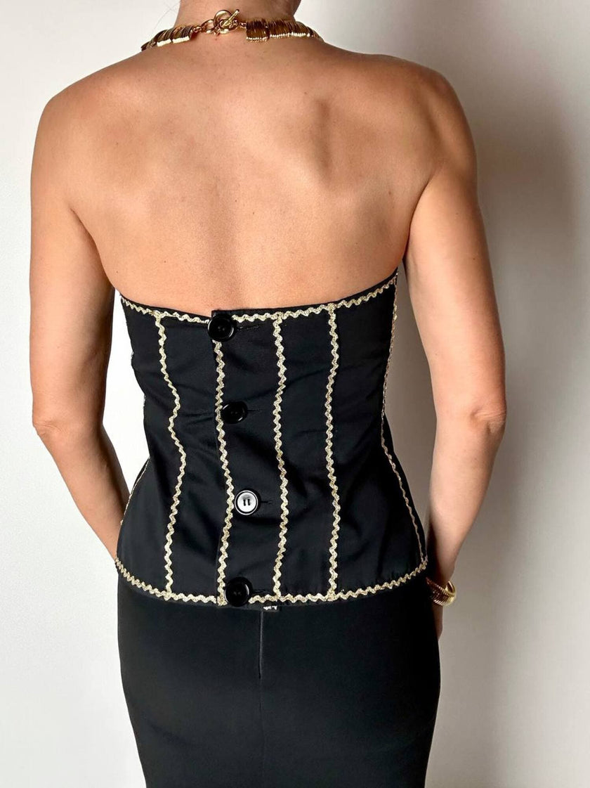 Bustier vintage Yves Saint Laurent en tissu noir agrémenté d'un galon serpentin en lamé doré