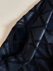 Blusa vintage in pelle nera patchwork con lavorazione crochet e maniche a pipistrello