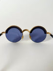Occhiali da sole vintage Oliver Valentino con montatura gioiello dorata e lenti blu
