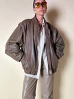 Bomber con maniche rimovibili in pelle color fango “Arpell”