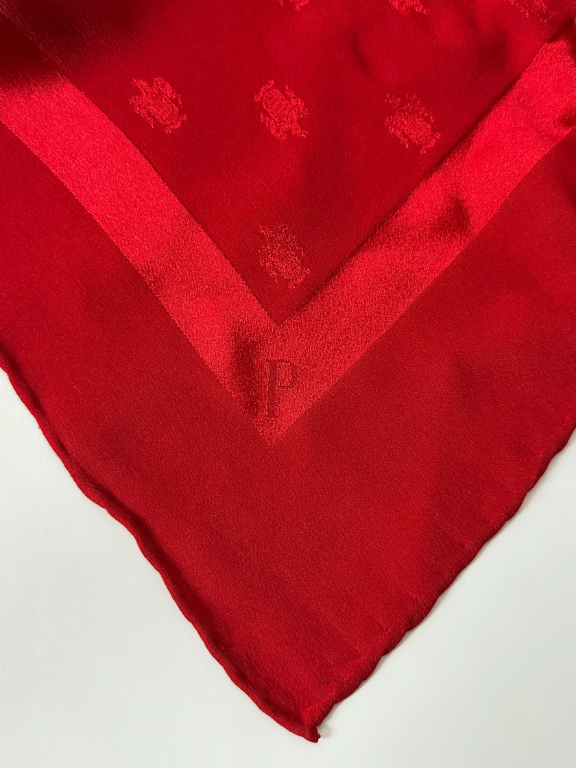 Foulard vintage in seta jacquard rosso con motivi ornamentali