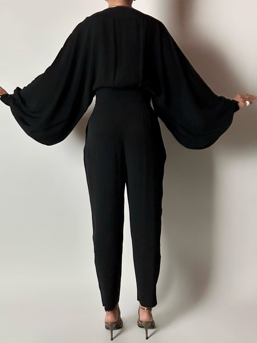 Jumpsuit vintage Emilio Pucci nera con maniche a pipistrello e nappa couture