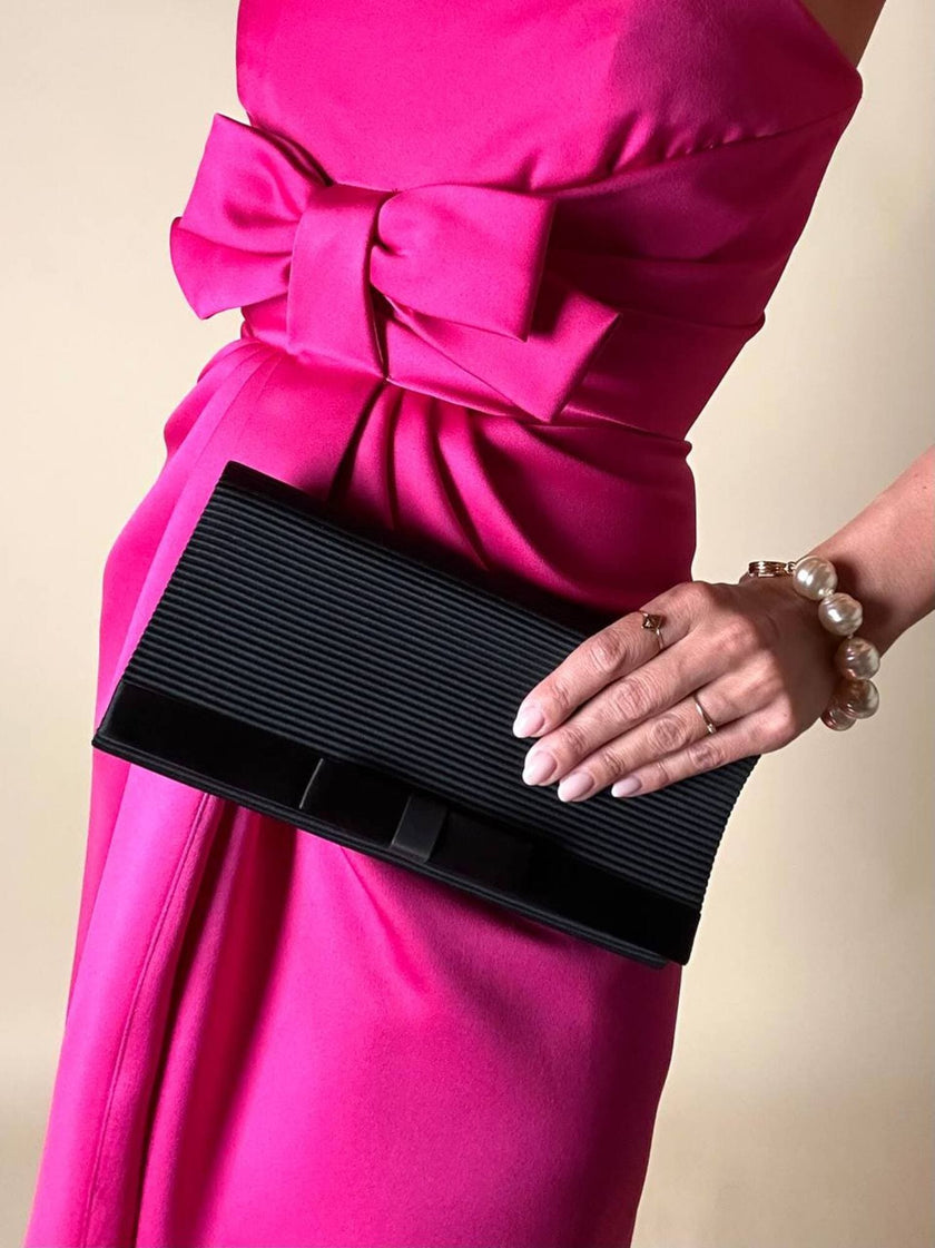 Pochette nera con fiocco in tessuto canneté