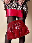Pochette in whips rossa con tracolla regolabile