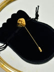 Spillone vintage Yves Saint Laurent dorato con pepita martellata