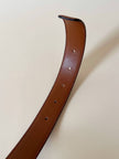Vintage Yves Saint Laurent tan leather belt with an octagonal enamel buckle and YSL logo
