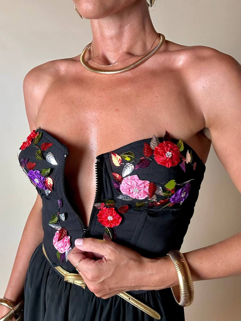 Bustier in cotone nero ricamato con fiori e paillettes e piccole coccarde multicolor “Giorgio Kauten”