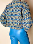 Cardigan Missoni Sport con pattern geometrico e trama tridimensionale nei toni del verde e blu