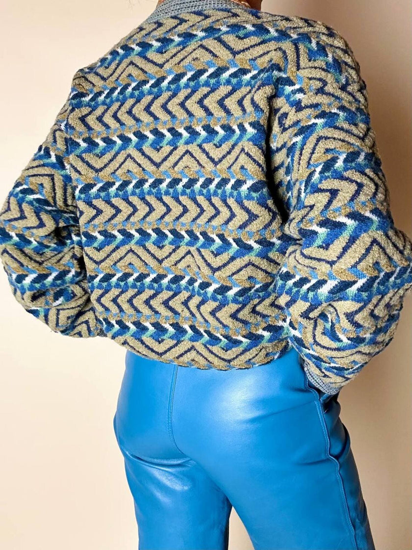 Cardigan Missoni Sport con pattern geometrico e trama tridimensionale nei toni del verde e blu