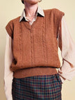 Gilet in lana color tabacco con motivo a trecce