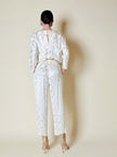 Jumpsuit vintage Spengler Mode in viscosa jacquard avorio con scollo drappeggiato