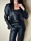 Blazer vintage in pelle nera Elizé Paris sciancrato con bottoni ricoperti in pelle