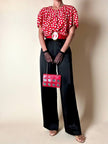 Mini abito rosso in seta jacquard a pois con fusciacca in coordinato “Fendi”