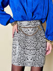Minigonna vintage Laura Prisco in pelle bianca stampa pitone nei toni del nero e grigio