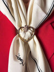 Ferma foulard dorato a forma di cuore “Yves Saint Laurent”
