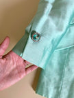 Tailleur giacca e gonna in shantung di seta acqua marina con bottoni gioiello “Escada”