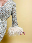 Lace tailleur con piume di marabù