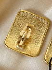 Maxi clip oro con logo “Yves Saint Laurent”