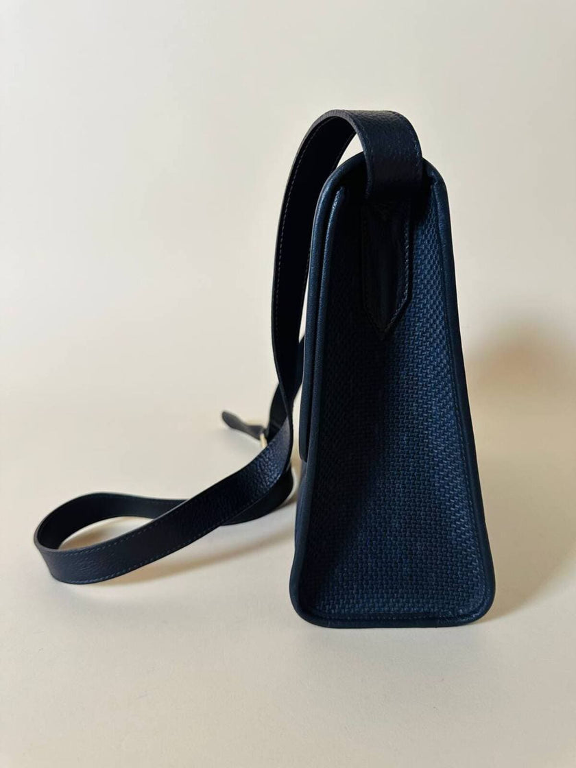 Borsa messenger in tessuto plastificato e pelle blu “Yves Saint Laurent”