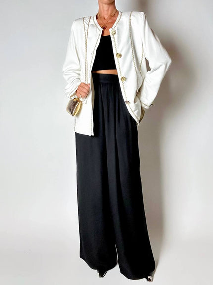 Giacca vintage Yves Saint Laurent bianco latte con serpentine dorate e bottoni gioiello