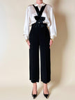Pantalone nero con bretelle e maxi fiocchi in raso “Moschino Cheap and Chic”