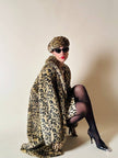 Eco pelliccia leopardata con maxi bottoni neri