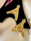 Clip dorate a forma di Torre Eiffel “Yves Saint Laurent”