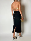 Top vintage con schiena nuda in pelle laminata oro