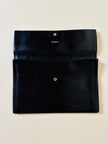 Pochette vintage Yves Saint Laurent in pelle nera con greca logata in rilievo