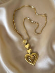 Collana dorata con ciondolo pendente a cuoricini “Yves Saint Laurent”