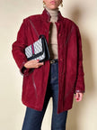 Giacca in suede borgogna con riporti in pelle e con interno in lana mélange in tinta