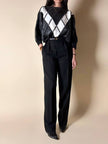 Blusa vintage in pelle nera e bianca patchwork con lavorazione crochet e maniche a pipistrello