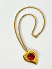 Collier vintage Yves Saint Laurent con ciondolo a forma di cuore firmato e cabochon rosso