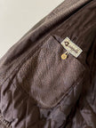 Bomber con maniche rimovibili in pelle color fango “Arpell”