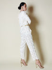 Jumpsuit vintage Spengler Mode in viscosa jacquard avorio con scollo drappeggiato
