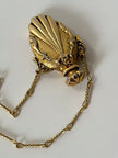Collana vintage dorata con ciondolo a forma di bottiglia di profumo