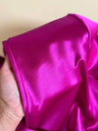 Wrap dress in raso ciclamino con cintura in coordinato “Sartoria Oriana Neri”