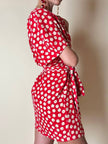 Mini abito rosso in seta jacquard a pois con fusciacca in coordinato “Fendi”