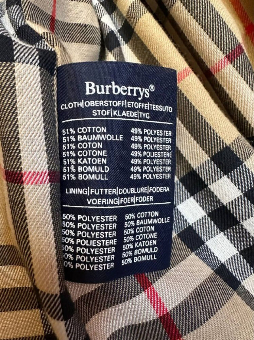 Vintage Burberry’s beige quill gabardine trench coat with matching belt and Check lining