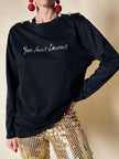Maglia in cotone nero con bottoni dorati “Yves Saint Laurent”