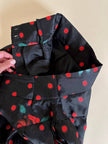 Gonna a ruota in organza jacquard nera a pois rossi con rose rosse dipinte