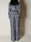 Jumpsuit in seta fantasia zebrata con maxi fiocco al collo