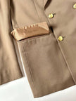 Blazer vintage Yves Saint Laurent in lana cachi doppiopetto con bottoni logati oro