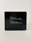 Pochette Beauté vintage Yves Saint Laurent in camoscio nero con nappine e specchio