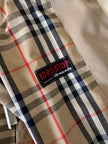 Trench color sabbia con fodera tartan “Idrostop”