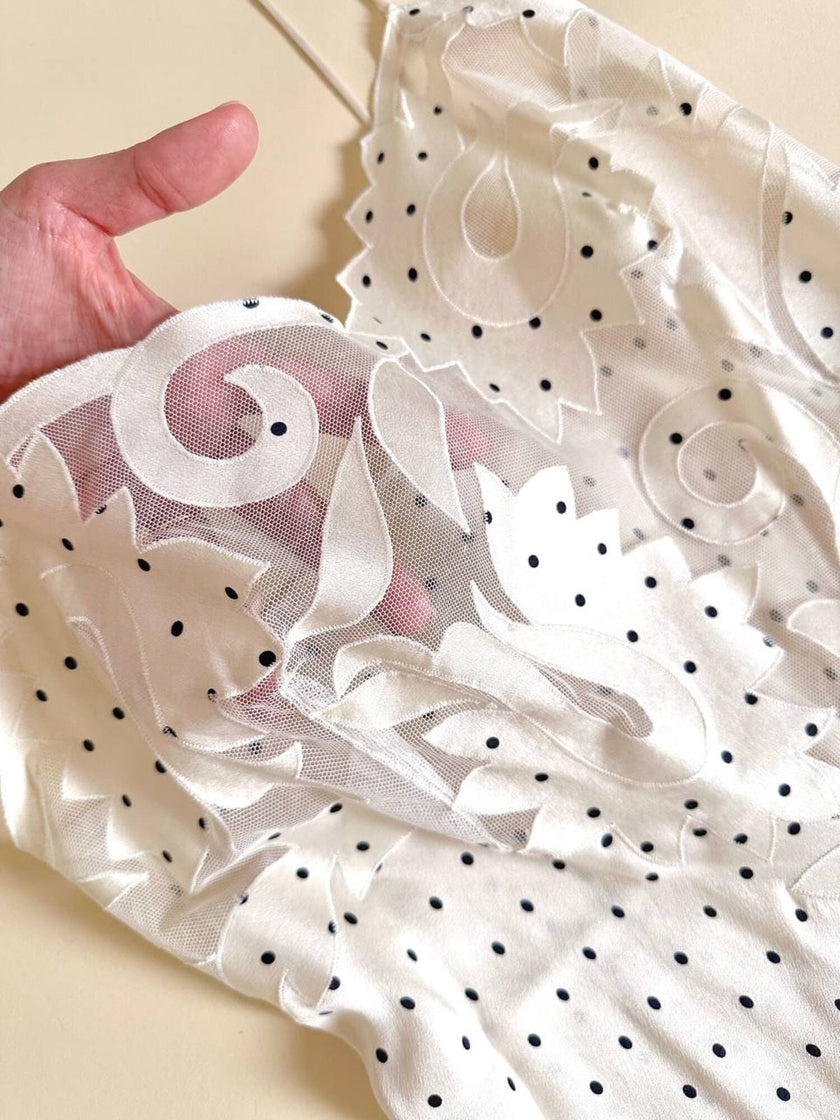 Slip dress in seta avorio a pois neri con corpetto lavorato “La Perla”