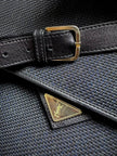 Borsa messenger in tessuto plastificato e pelle blu “Yves Saint Laurent”
